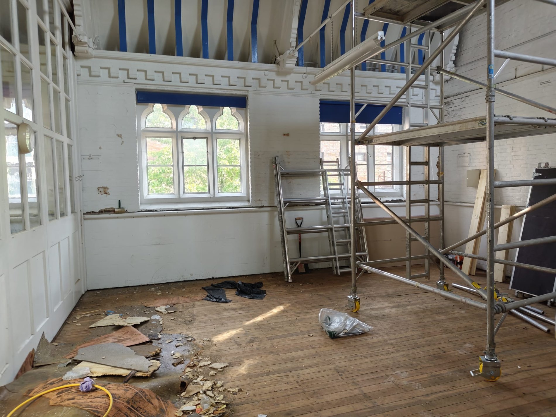 Hall refurbishment — works in progress, ceiling and joinery protected